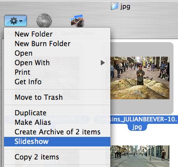 2) Open the "gear" menu and pick Slideshow.